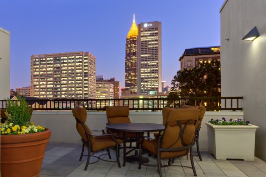 Rooftop Apartment Terrace with Atlanta Skyline at Night